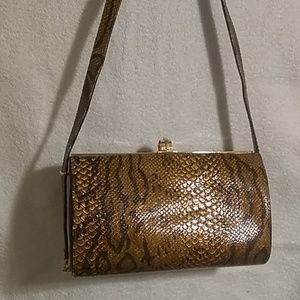 Snake skin clutch purse